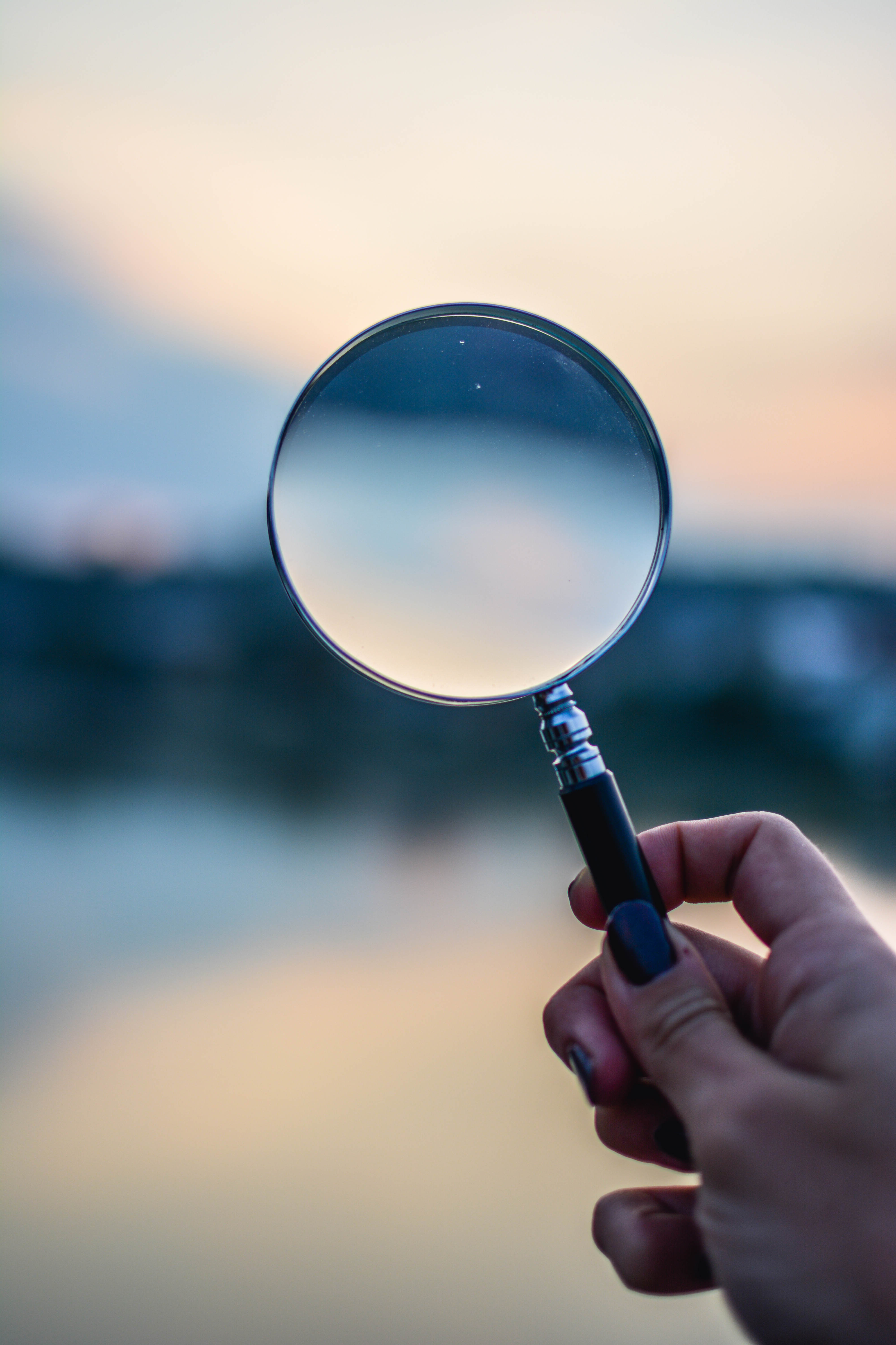 Canva_-_Selective_Focus_Photo_of_Magnifying_Glass.jpg
